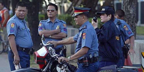 Polisi Filipina. dailymail.co.uk ©2015 Merdeka.com
